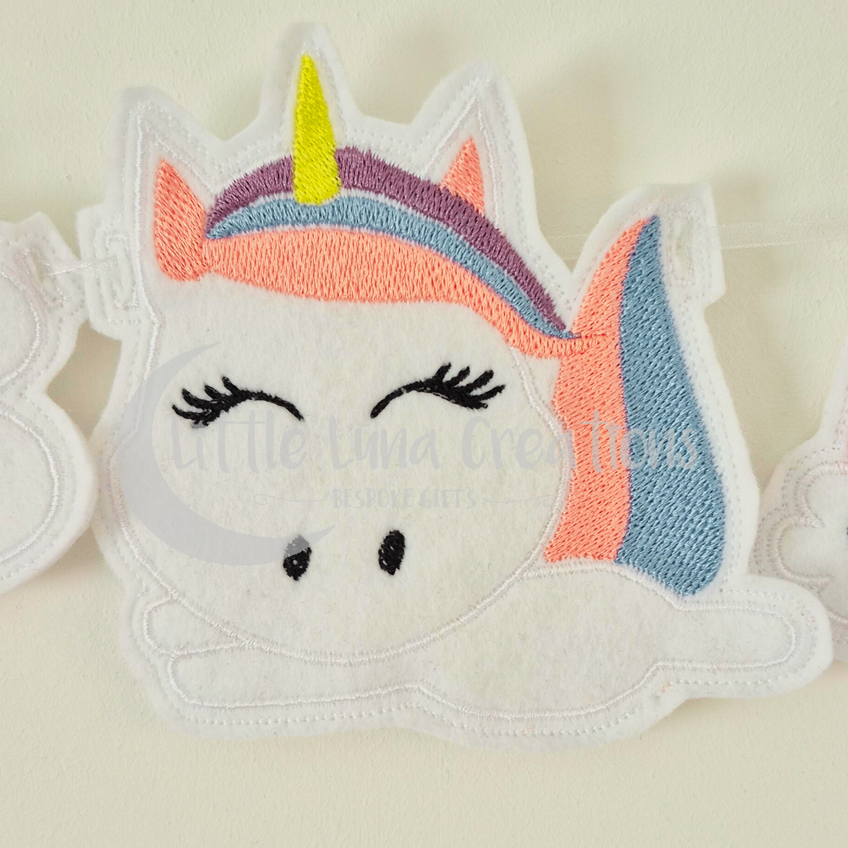 Felt machine embroidered unicorn bunting designs